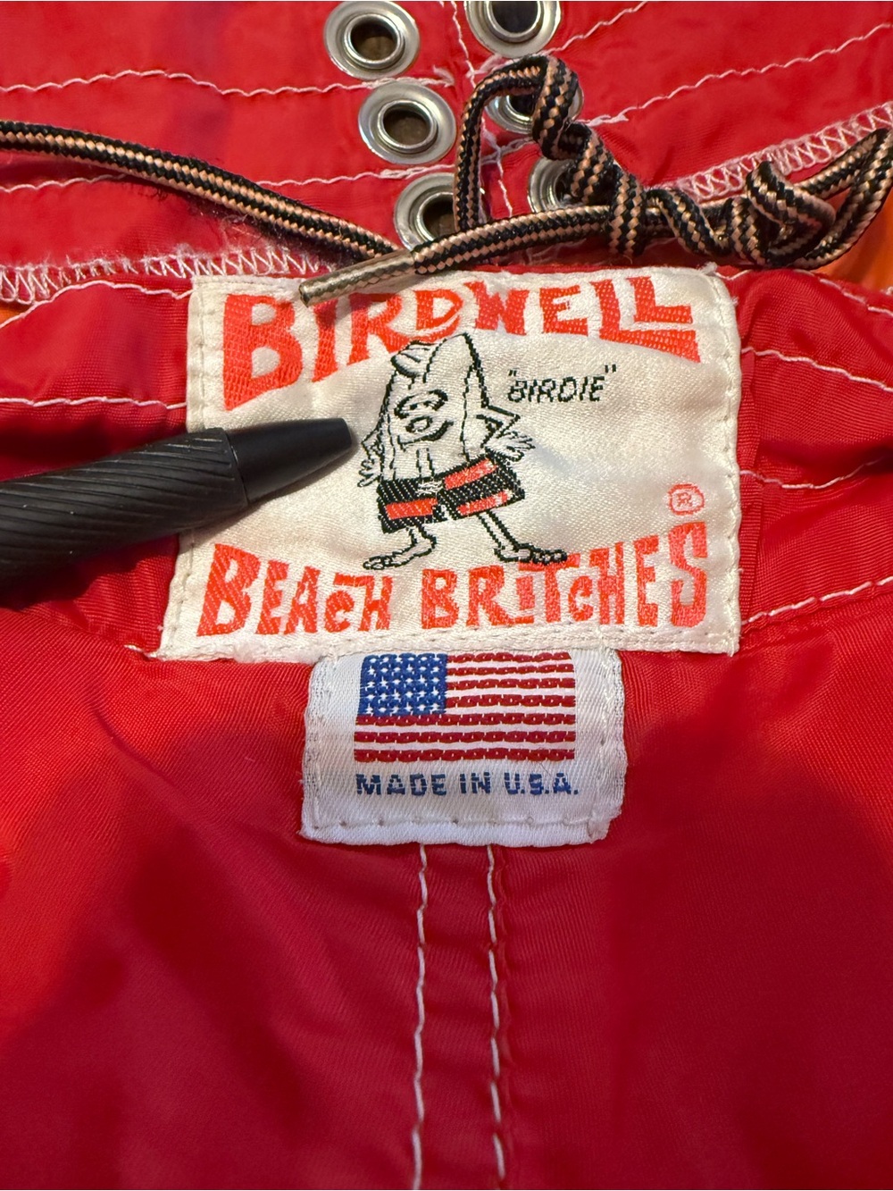 1970’s Birdwell Beach Britches red lifeguard board shorts velcro grommets small